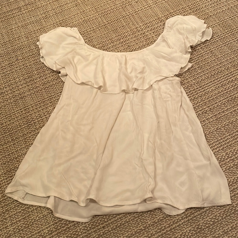 White shirt sleeve ruffle shirt